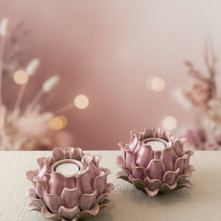 Decorative ceramic items on a table with a neutral background